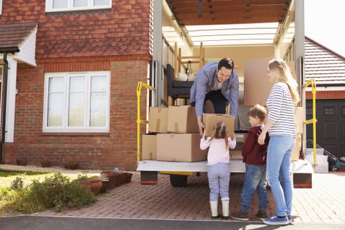 Waste and unwanted items being separated for lawful disposal during a move