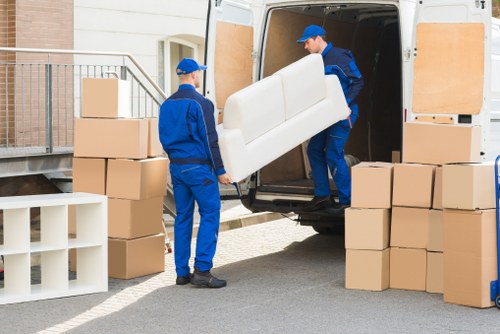 Mover wearing PPE during a relocation task