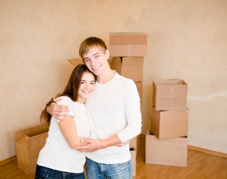 Professional movers loading furniture for a Hollandpark house relocation