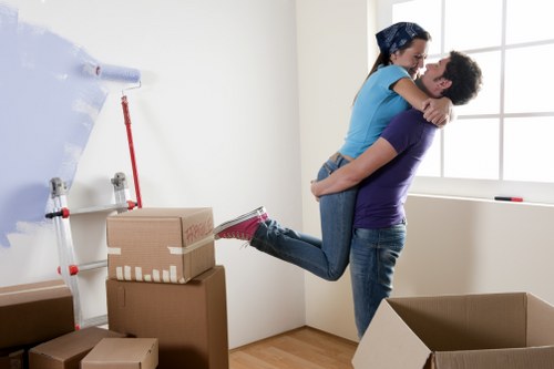 Boxes and household items separated for recycling and donation during a move